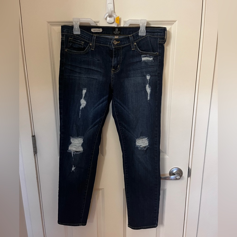 Just black distressed jeans.